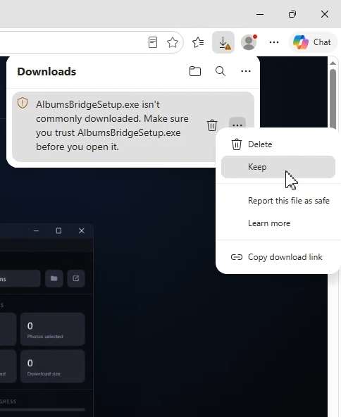 Browser downloads panel warning that AlbumsBridgeSetup.exe isn't commonly downloaded, with the Keep option highlighted