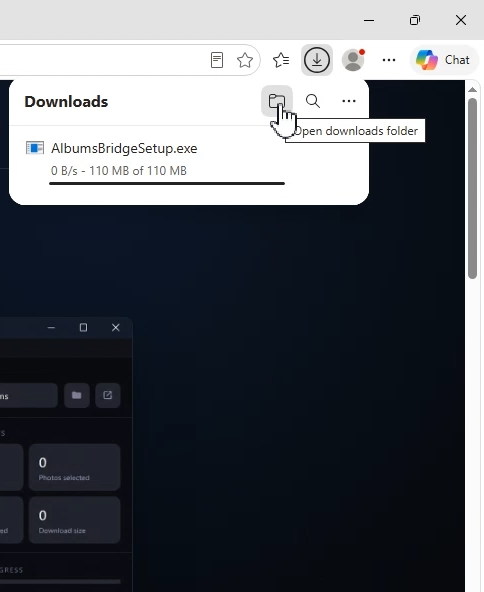 Browser downloads panel showing the finished download, with the Open downloads folder button highlighted
